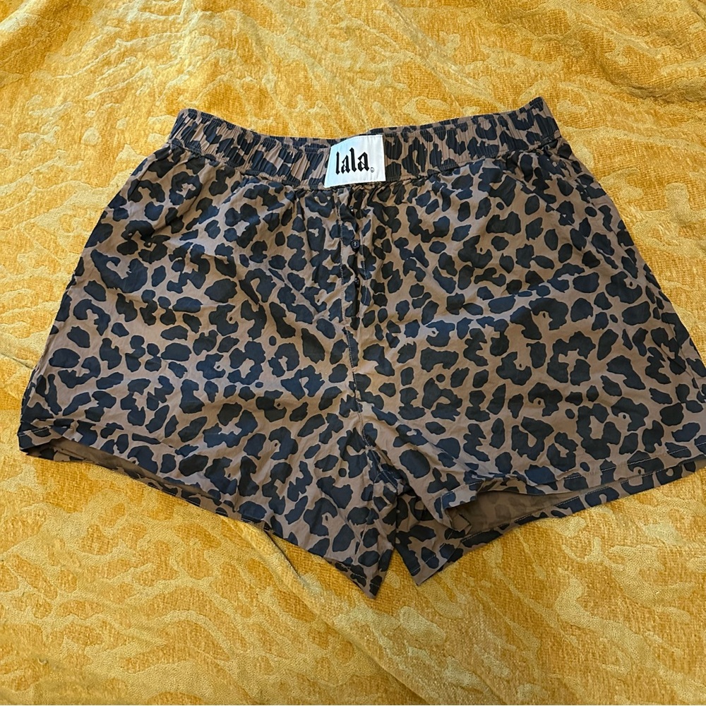 Dressed in LALA Brown and Black Athletic Shorts Leopard Print